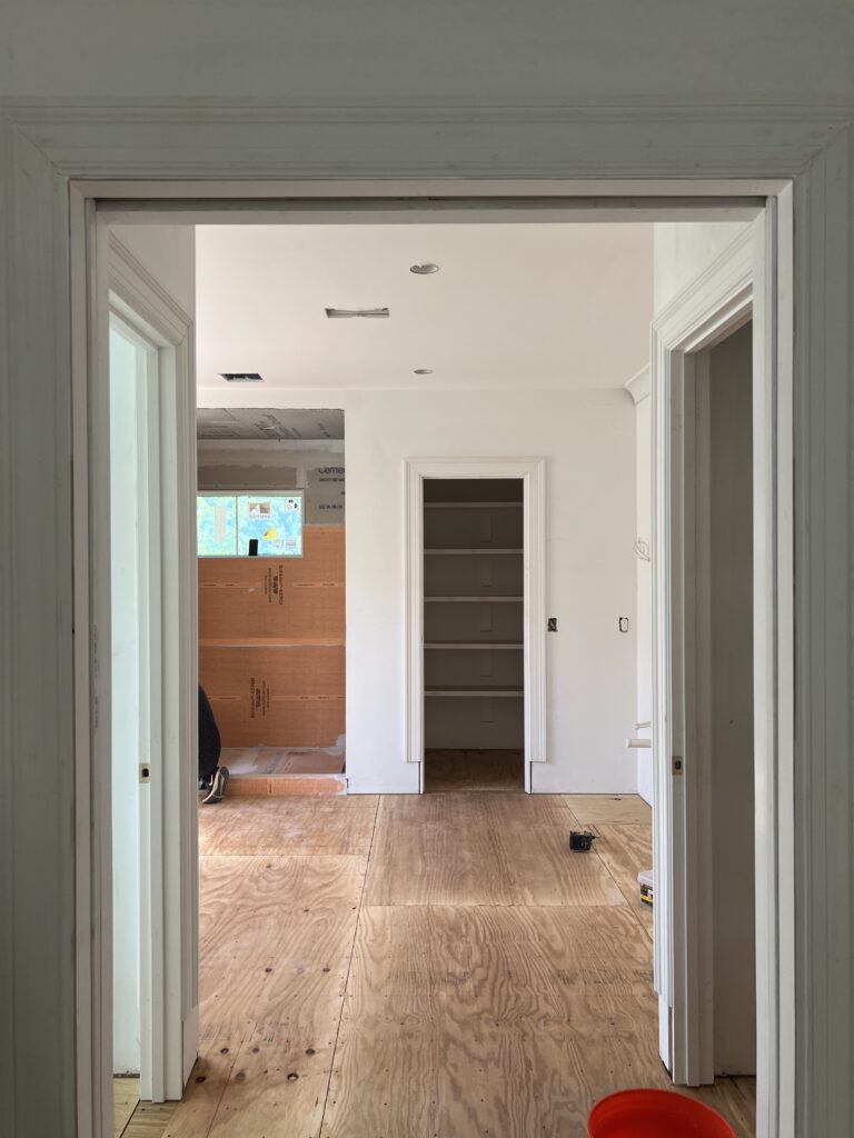 In-progress primary bathroom in a Rock Spring spec home in Arlington, Virginia, featuring timeless finishes selected by Rosehill Design Studio